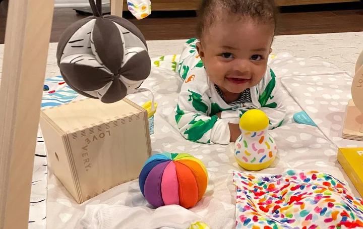 Baby with Tummy Time toys